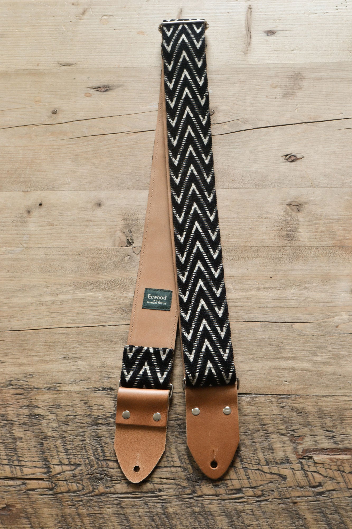 black guitar strap by Etwood Studios