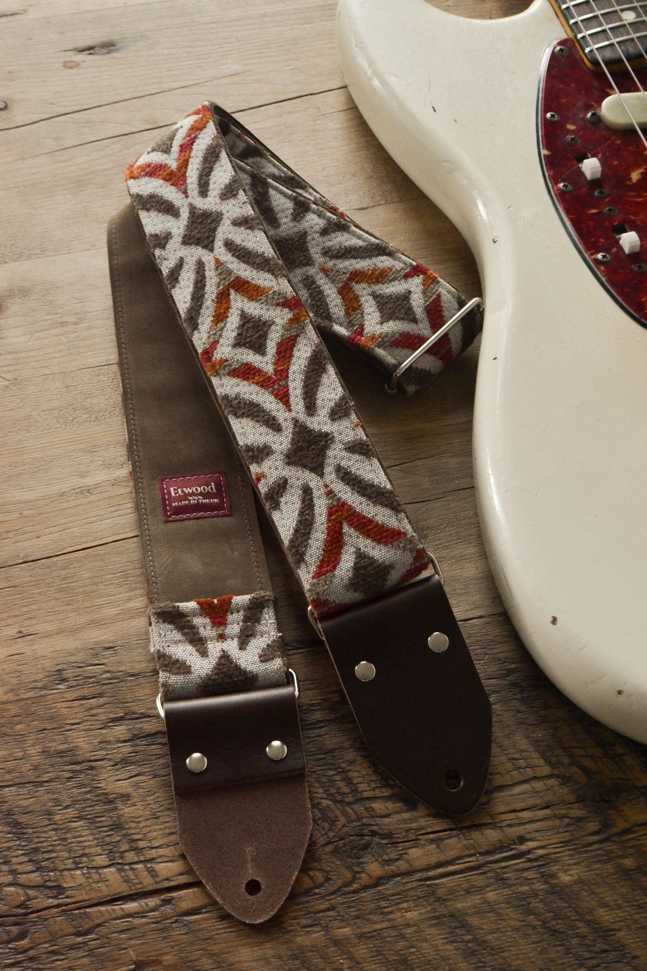 red guitar strap, handmade by Etwood Studios